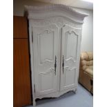 A painted pine double door armoire