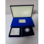 A cased Queen Elizabeth II silver jubilee commemorative proof stamp together with a Royal Mint