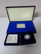 A cased Queen Elizabeth II silver jubilee commemorative proof stamp together with a Royal Mint