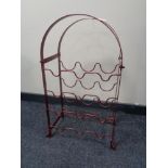 A wrought iron wine rack