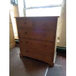 A pine five drawer chest