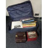 A luggage case of vinyl LP's and box sets together with two cases of 45's