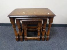 A nest of three Ercol tables