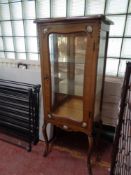 A French style display cabinet with ormolu mounts