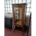 A French style display cabinet with ormolu mounts