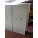 A double door metal stationary cabinet
