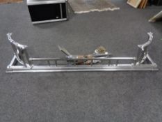 A 1930's chrome fire curb and companion set CONDITION REPORT: The inner width is