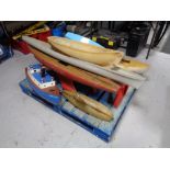 A pallet of part remote control boat and boat pulls