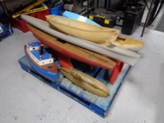 A pallet of part remote control boat and boat pulls