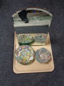 A tray of early twentieth century hand painted glass dish, four glass plates with decoration,