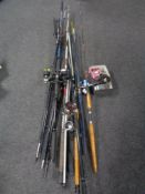 A large bundle of sea and river fishing rods inc.