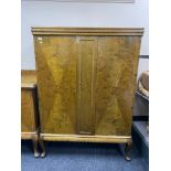 An early twentieth century double door side cabinet