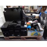 A pallet of a large quantity of electricals to include four PC tower, PC monitors, flat screen TV's,