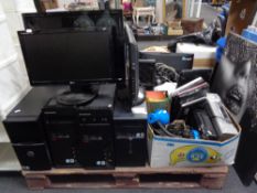 A pallet of a large quantity of electricals to include four PC tower, PC monitors, flat screen TV's,