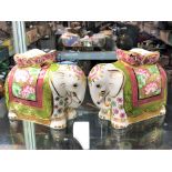 A pair of Royal Crown Derby Mother Indian Elephant paperweights with stoppers