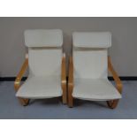 A pair of beech framed Ikea relaxer chairs