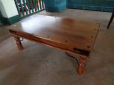 A sheesham wood coffee table