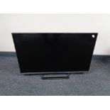 A Panasonic 32 inch model TX-32DS 500B tv with remote