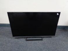 A Panasonic 32 inch model TX-32DS 500B tv with remote