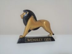 A Kew & Brockley metal figure - Wembley Lion 1924 CONDITION REPORT: 8cm long by 2cm