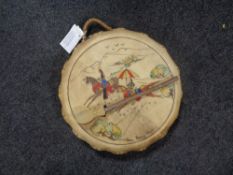 A hand painted limited edition native American hand drum with beater