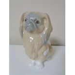 A Lladro figure the Pekingese dog.