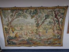 A large wall tapestry depicting an18th century country scene CONDITION REPORT: