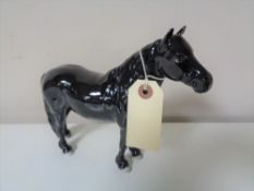 A Beswick black gloss horse