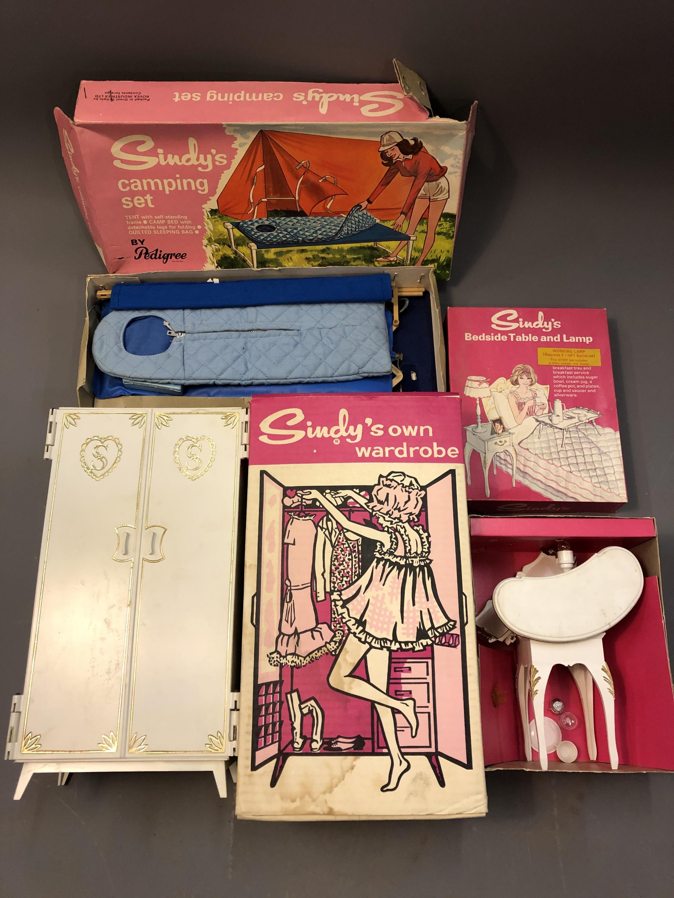 Sindy toys: Sindy's Bedside Table and Lamp, Camping Set and Sindy's Own Wardrobe.