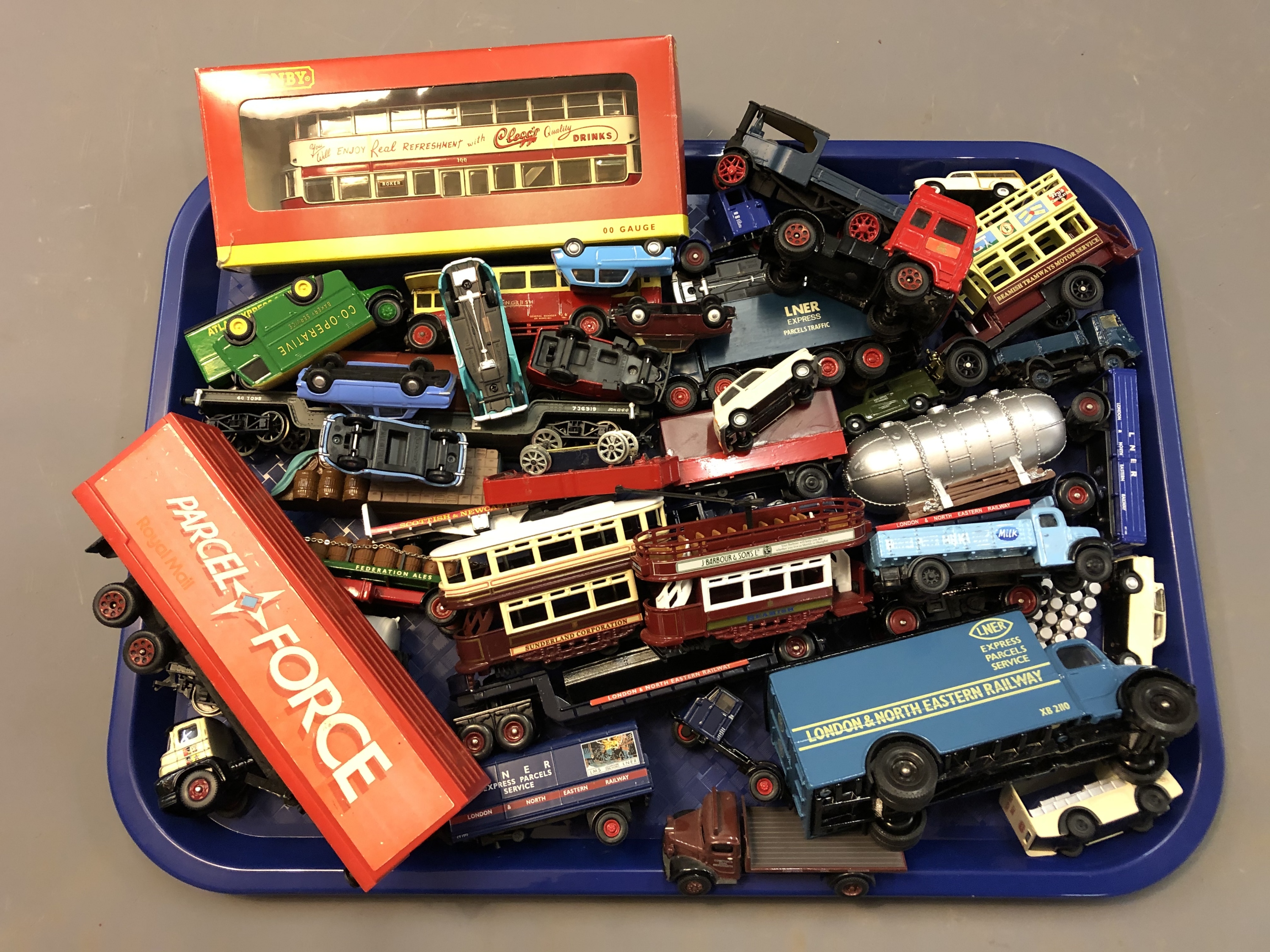 A collection of mostly unboxed die cast vehicles; LNER, Beamish Tramways, Royal Mail,