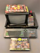 An Amstrad 64K Colour Personal Computer keyboard and monitor, Amstrad magazines,