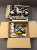 Two NewRay die cast BMW R1200cc motorbike modelling kits (one already assembled).