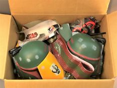 A collection of Star Wars costumes and accessories : Boba Fett costume, Darth Vader masks etc.