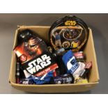A box of Star Wars related collectables and sundries including gift bags, hats and caps,