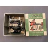 A Singer No. 20 Child's Sewing Machine, boxed.