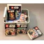 A quantity of Lego Star Wars models and related material including Lego Star Wars character