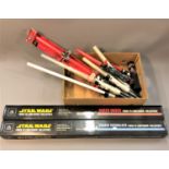 Two Star Wars Force FX Lightsaber collectable's, in original packaging,