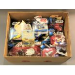 A collection of Star Wars Hot Wheels vehicles, all in original packaging.