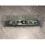 A large model ship behind glass, length 123cm.