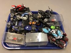 Fourteen various die cast model motorcycles.