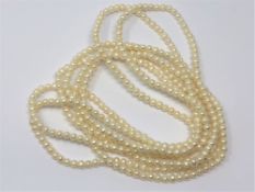 An approximately 95 inch strand of pearls