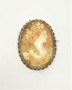An antique gold cameo brooch