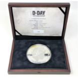 A 2014 D-day 70th Anniversary Jersey silver 10 oz coin, limited edition 46/145, 311.86g.