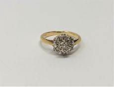 An 18ct gold diamond ring, 2.2g.