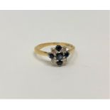 An 18ct gold sapphire and diamond ring, 2.2g.