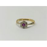 An antique 18ct gold ruby and diamond ring CONDITION REPORT: Ring size N.