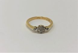 An antique 18ct gold floral cluster ring, 2.6g.