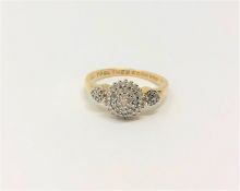 A diamond cluster ring together with a 'forever' ring, 2.82g.