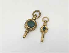 Two antique gold watch keys (2)