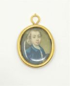 An early 18th century portrait miniature in high carat gold frame